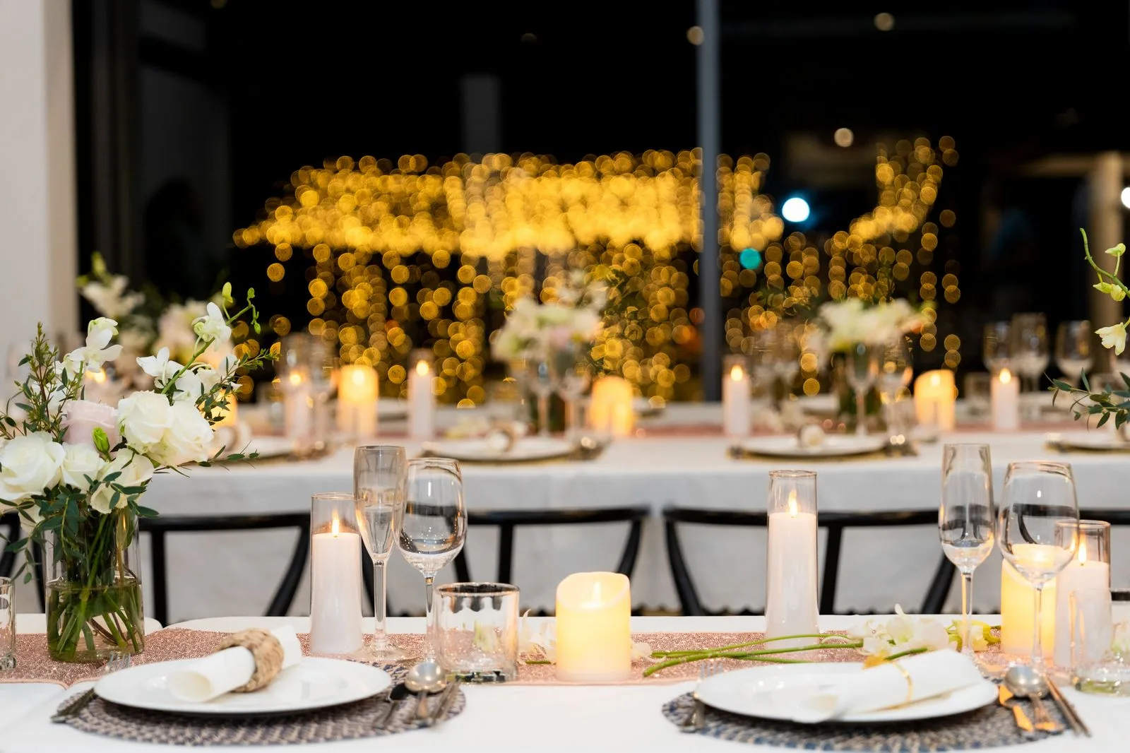 Romantic beach wedding setup at a private villa on Natai Beach, Thailand.