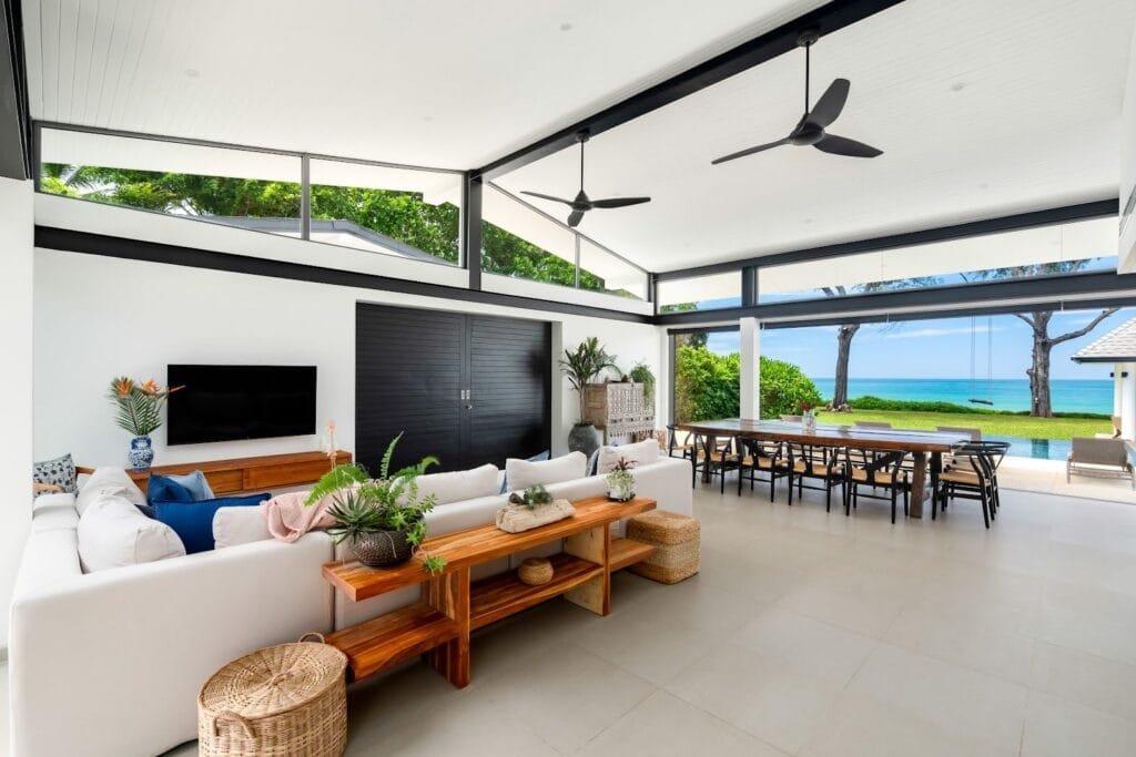 North Villa living room with sliding doors closed for privacy — Natai double villa private, exclusive villas Phuket.