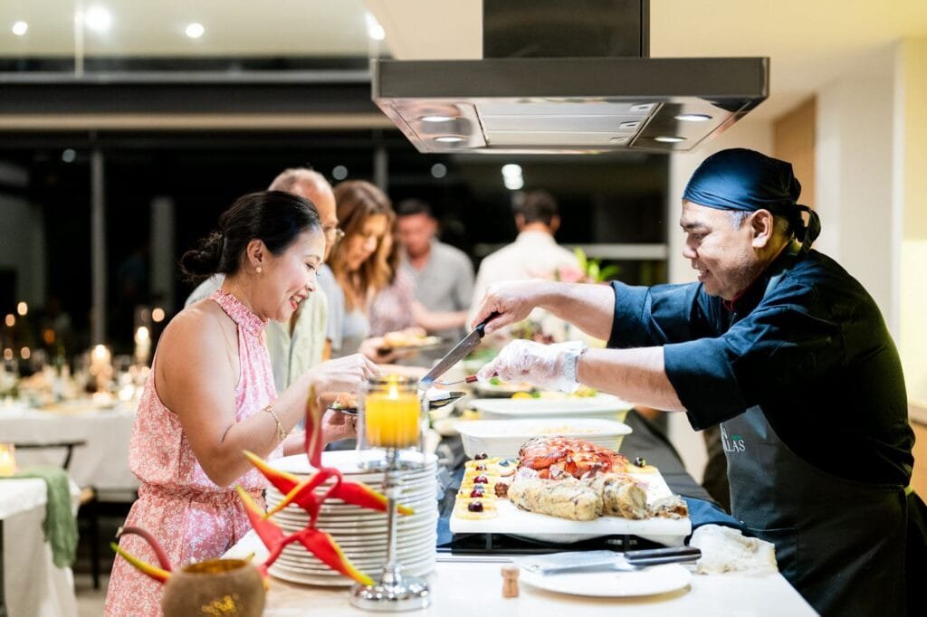Private chef preparing Thai-inspired Thanksgiving dinner with local ingredients at Twin Villas Natai.