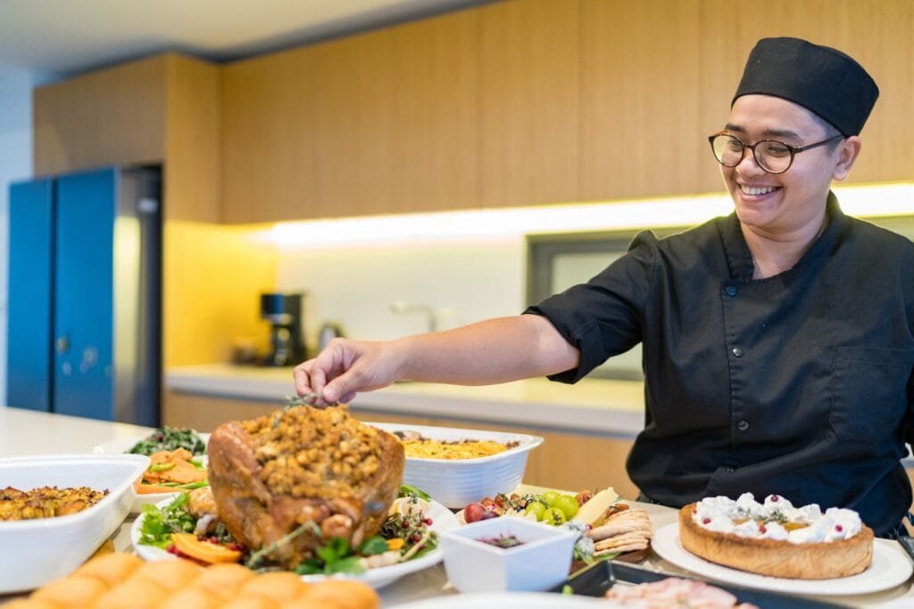 Private chef preparing Thai-inspired Thanksgiving dinner with local ingredients at Twin Villas Natai.