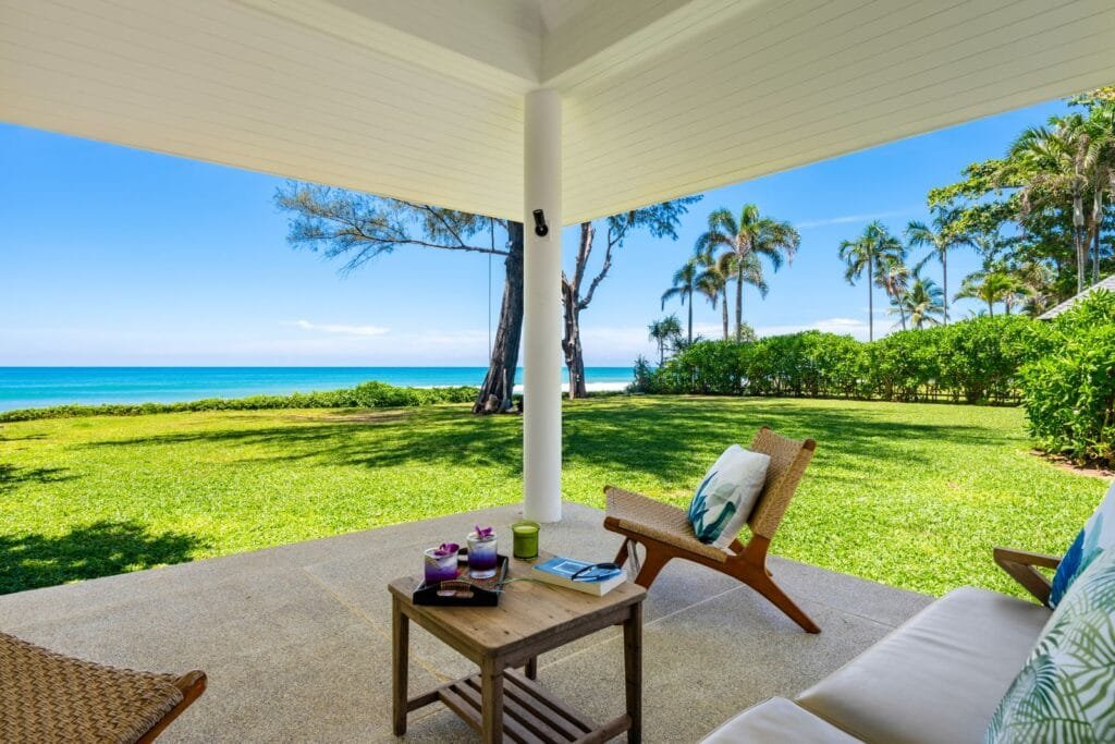 Open sala and tropical lawn at Twin Villas Natai set for a private beach wedding ceremony