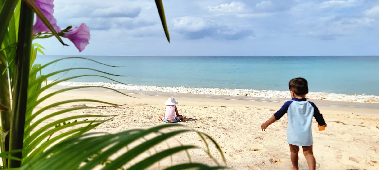 Top Family Activities In and Around Natai Beach | Twin Villas Natai Little explorers playing by the calm Andaman Sea right on the beach at Twin Villas Natai.