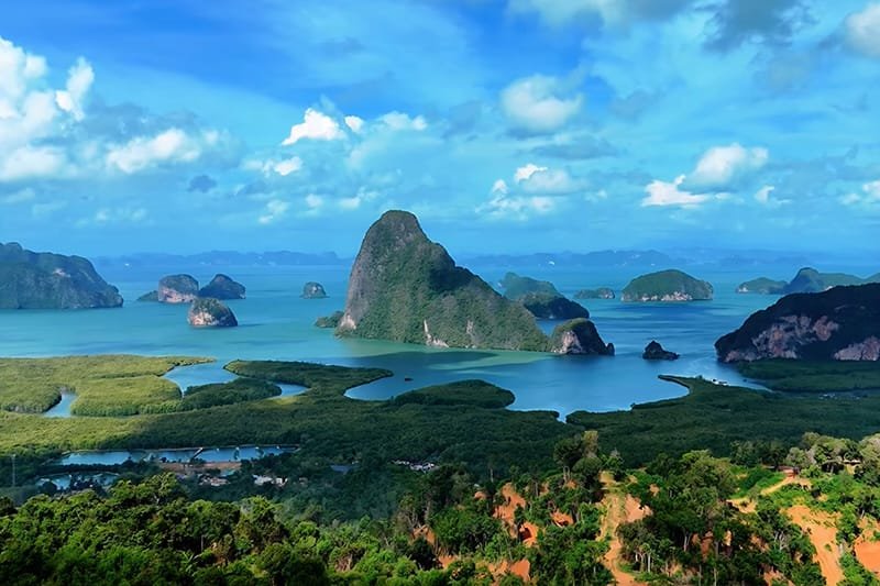 Discover Phang Nga Attractions: The Best Day Trips from Natai Beach, Thailand | Twin Villas Natai Daytime panorama from Samet Nangshe revealing mangrove channels and scattered karst islands across Phang Nga Bay.