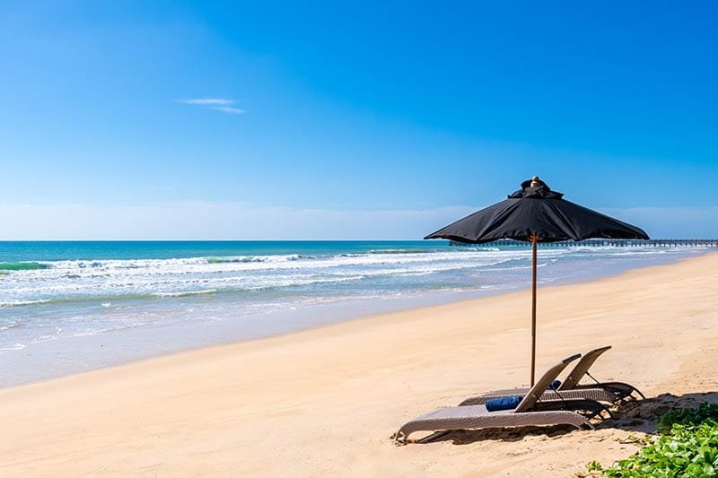 Natai Beach or Phuket? The Discerning Traveler’s Guide to Privacy and Access | Twin Villas Natai Quiet beachfront at Natai Beach in Phang Nga, Thailand, showing a wide sandy shoreline and Andaman Sea views near Twin Villas Natai.