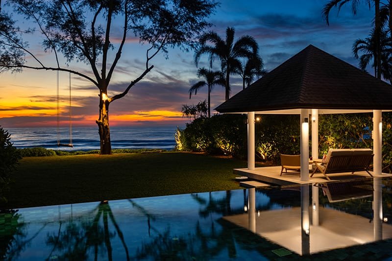 Discover Phang Nga Attractions: The Best Day Trips from Natai Beach, Thailand | Twin Villas Natai Sunset at Twin Villas Natai overlooking the Andaman Sea in Phang Nga, Thailand.